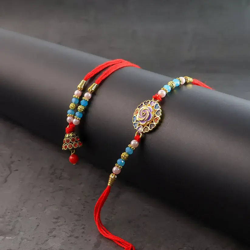 Bhaiya Bhabhi Rakhi Set – Designer Beads with Kundan Work & Enamel Floral Dial 3.webp