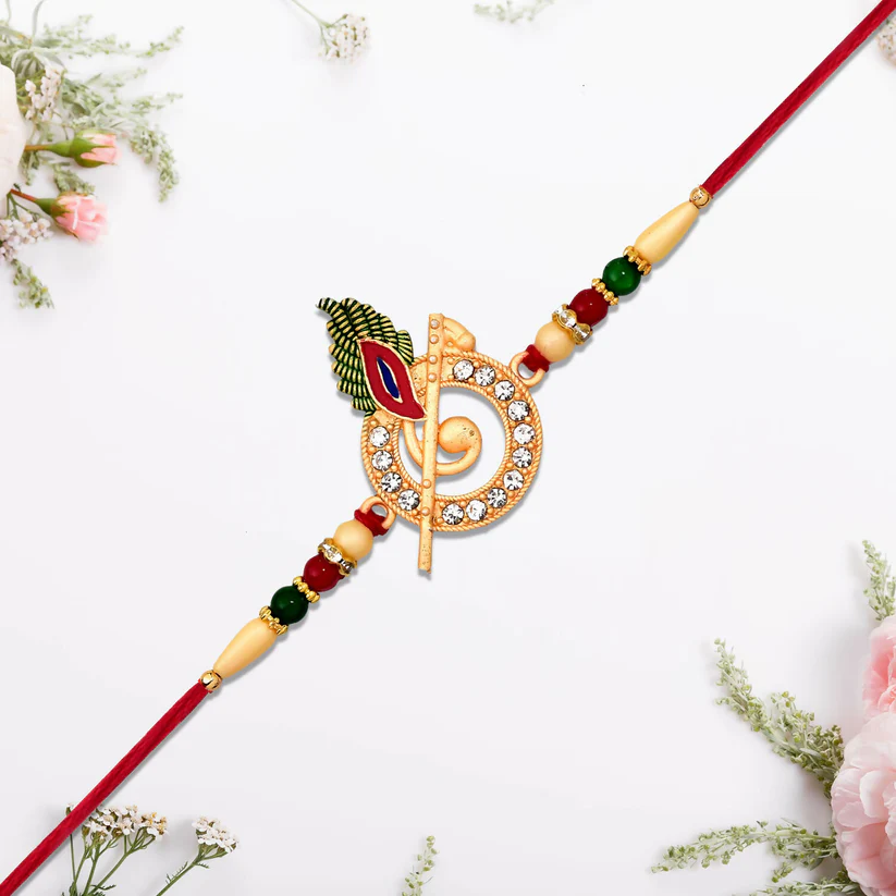 Krishna Flute Rakhi with Stone Studded Peacock Feather Design
